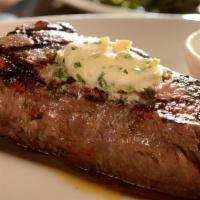 New York Strip · 14oz USDA Angus beef, aged 28 days. Served with mashed potatoes and bistro butter.