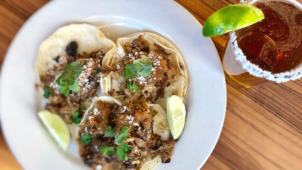 Street Tacos · Choose three: beef, chicken or pork carnitas, served on corn tortillas; fresh cilantro, diced onions. Served with homemade habanero papaya, roasted tomato and chipotle tomatillo salsas.
