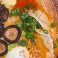 The Furious Ramen Bowl · spicy miso pork broth, house-made chashu, steamed chicken & pork dumplings, garlic relish, m...