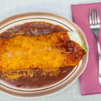 Smothered Burrito · Covered with Talita's enchilada sauce and cheddar cheese