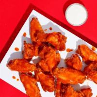 12 Chicken Wings · Crispy and juicy chicken wings with your choice of sauce!