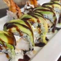 Caterpillar Roll · Shrimp tempura, crab salad, cream  cheese top with avocado and eel sauce