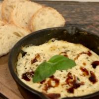 Baked Ricotta Dip · Whole milk ricotta cheese, asiago cheese, mozzarella cheese, fresh roasted garlic, egg yolks...