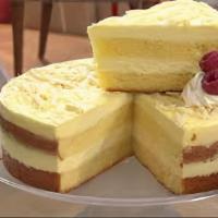 Limoncello Mascarpone Cake · Rich combination of Sicilian lemon infused sponge cake and Italian mascarpone topped with Eu...