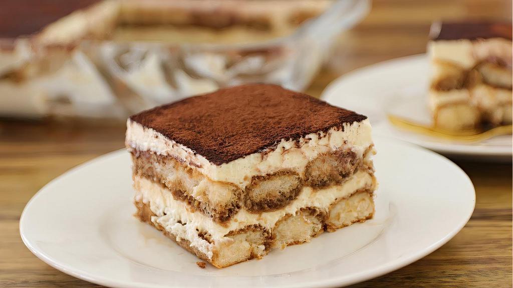 Tiramisu · layers of espresso drenched lady fingers separated by mascarpone cream and dusted with cocoa powder. Imported from Italy!
