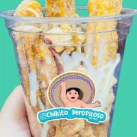 El Mexican -Churros · 4 Cajeta filled churro sticks with condensed milk and Cinamon toast crunch