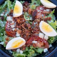 Not-So-Basic-Salad · Green leaf lettuce, tomato, cucumber, crumbled bacon, hard boiled egg, blue cheese, Shiner B...