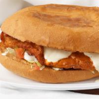 Buffalo Chicken Sandwich · Crispy chicken tossed in Buffalo sauce, topped with bleu cheese, lettuce and pico de gallo.
