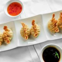 Crab Rangoon · Crab imitation and cream cheese with sweet and sour sauce.