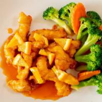 Orange Chicken · Battered chicken with broccoli and carrots in orange sauce. Include jasmine rice.