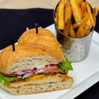 Chicken 'Wich · Overnight brined chicken breast, topped with cheddar cheese, crispy bacon, lettuce, tomato, ...