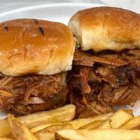 Pulled Pork Sliders (2) · Tossed in Texas Mop Sauce and served with Seasoned Fries