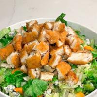 Crispy Chicken Salad · Romaine, shredded carrots, sliced celery, bleu cheese, and fried chicken bites. Choice of Wi...