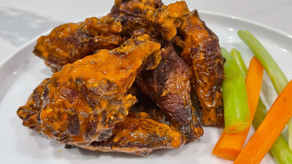 Spicy Buffalo Wings · This sauce is sure to please all classic Buffalo wing fans. Roasted Fresno peppers, red wine vinegar and butter bring this sauce together, with a slightly sweet finish from roasted red peppers.