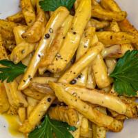 Cheese Fries · Crispy french fries, tossed in kosher salt and cracked black pepper, topped with our creamy ...