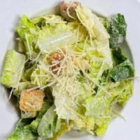 Caesar · Chopped romaine tossed with Parmesan cheese, croutons and caesar dressing.