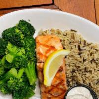 Atlantic Salmon · Char-grilled or blackened, served with wild rice, a choice of side and dill cream sauce. Ple...