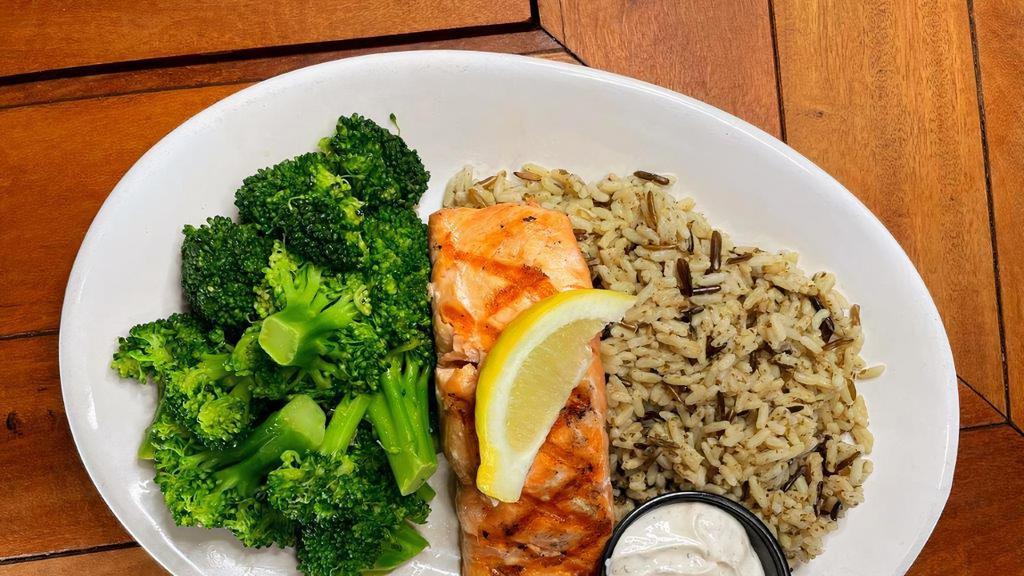 Atlantic Salmon · Char-grilled or blackened, served with wild rice, a choice of side and dill cream sauce. Please indicate meat temp.

Consuming undercooked meat or seafood may increase your risk of food borne illness.