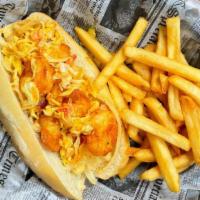 Shrimp Po' Boy · Crispy fried shrimp tossed with shredded lettuce, tomato, onion and cajun mayo, stuffed in a...