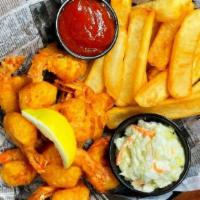 Shrimp & Chips · Jumbo shrimp, hand-battered and fried, served with steak fries, a side garnished of coleslaw...