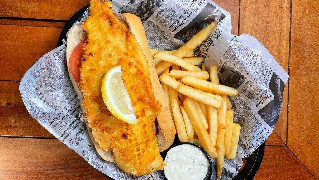 Fish Sandwich Traditional Style · Our white fish hand-battered and deep-fried, blackened or broiled, served on a fresh hoagie roll with lettuce, tomato, red onion and choice of side.