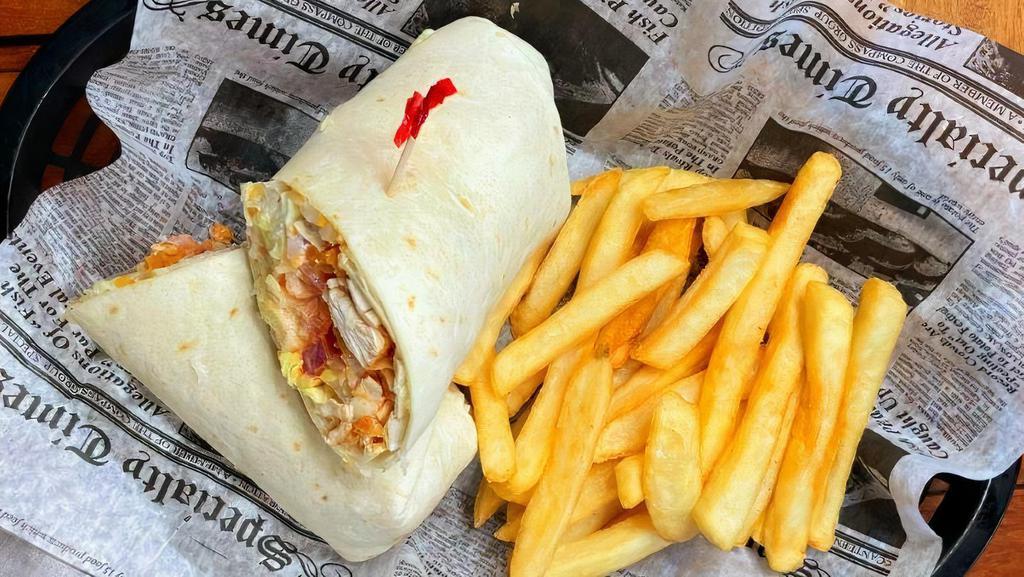 Buffalo Chicken Wrap · Fried chicken tenders dipped in buffalo sauce, shredded cheddar, lettuce, tomato, onion and blue cheese dressing wrapped up in a soft flour tortilla.