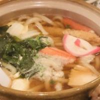 Seafood Tempura Udon · Udon noodle soup topped with seafood and vegetable tempura