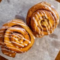 Mini Momma Cinnamon Roll · Bite size 
Choose your topping: Traditional icing, caramel, chocolate, pecans, or raisins
ex...