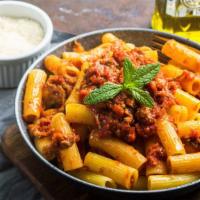 Rigatoni Vodka · Rigatoni pasta mixed with sautéed red and yellow
peppers, tossed in our creamy vodka sauce
(...