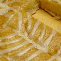 Warm Cinnamon Pene Bread · Thick and warm smothered in cinnamon and dashed with confectiners powerdered sugar, accompai...