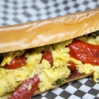 Pepper & Egg Sandwich  · Creamy scrambled eggs with caramelized sweet red and green peppers served on French bread. M...