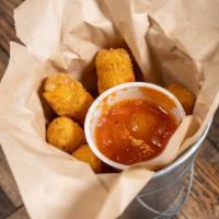 Mozzarella Cheese Sticks · Mozzarella cheese that has been coated and fried. served with marinara sauce.