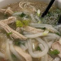 Kow Piek (Noodle Soup) · Freshly made rice noodles served with boiled herb chicken garnished with cilantro, green oni...