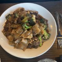 Pad See Euw · Choice of protein stir-fried wide rice noodles, eggs, broccoli and dark soy sauce. Chicken, ...