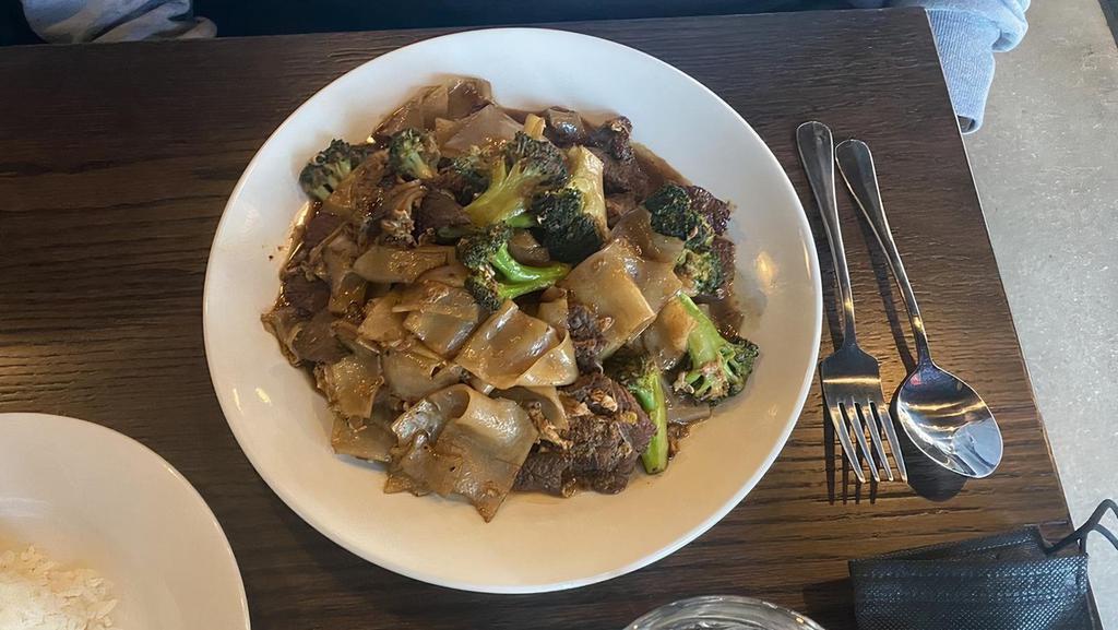 Pad See Euw · Choice of protein stir-fried wide rice noodles, eggs, broccoli and dark soy sauce. Chicken, Beef, Pork or Veggies. Add shrimp for an additional charge.