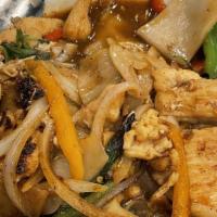 Pad Kee Mao (Drunken Noodles) · Choice of protein stir-fried wide rice noodles, bell peppers, sliced onions and garlic chili...