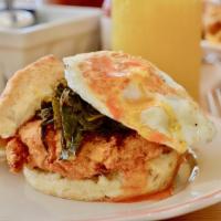 Charleston Sandwich · Fried chicken, collard greens, hot sauce, fried egg.