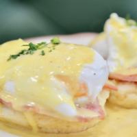 Benny · Open-faced biscuit, ham, poached eggs, red-eye hollandaise. Add Collards for an additional c...
