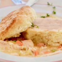 Chicken Pot Pie · Pulled chicken, peas, carrots, onions, topped with a biscuit.