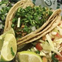 Taco Dinner · Three tacos. Rice & Beans