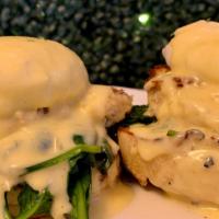 Crabby Pattie Bennie · Crab Cake, Sauteed Spinach, Poached Eggs and Savory Hollandaise over toasted English Muffin