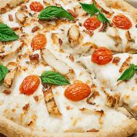 Alfredo Pomodoro · Sarpino's traditional pan pizza baked to perfection and topped with creamy Alfredo sauce, te...