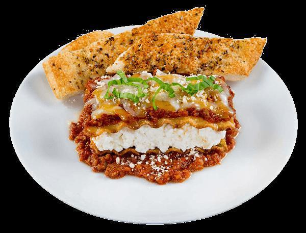 Baked Lasagna · Sarpino's famous lasagna, smothered in your choice of homemade meat sauce, tomato vegetarian or creamy Alfredo sauce, topped with sharp Parmesan and our signature gourmet cheese blend and baked to perfection.