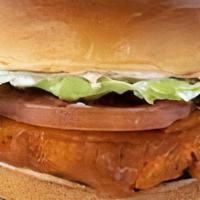 Buffalo Chicken Sandwich · Our crispy chicken tossed in Buffalo sauce. Served with lettuce, tomato and ranch on a brioc...