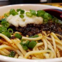 Dan Dan Noodles · Spicy level 1. A classic szechuan street food, fresh wheat noodles topped with ground pork a...