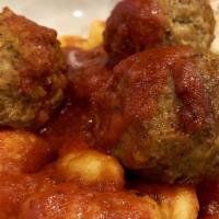 Gnocchi & Meatballs · Homemade  potato gnocchi and meatballs with house tomato sauce.