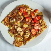 Nutella Crepes · Two Crepes stuffed with Fresh Strawberries or Bananas and drizzled with Nutella