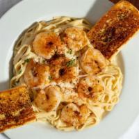 Fettuccine Alfredo With Shrimp · Fettuccine pasta mixed with our own alfredo sauce.