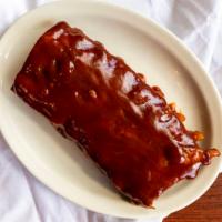 Barbeque Baby Back Ribs · 1/2 Rack of Barbecue Baby Back Ribs. served with soup or salad and choice of potato