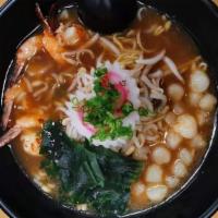 Seafood Shoyu Ramen · Pork broth, topped with shrimp, scallop, beans sprouts, wakamen, naruto and scallions.